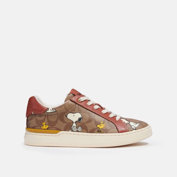 COACH X PEANUTS CLIP LOW TOP SNEAKER IN SIGNATURE CANVAS WITH SNOOPY WOODSTOCK PRINT